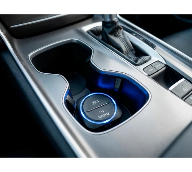 Technaxx Secure Drive Mini TX-387 mit blauem Warnlicht im Getränkehalter der Mittelkonsole